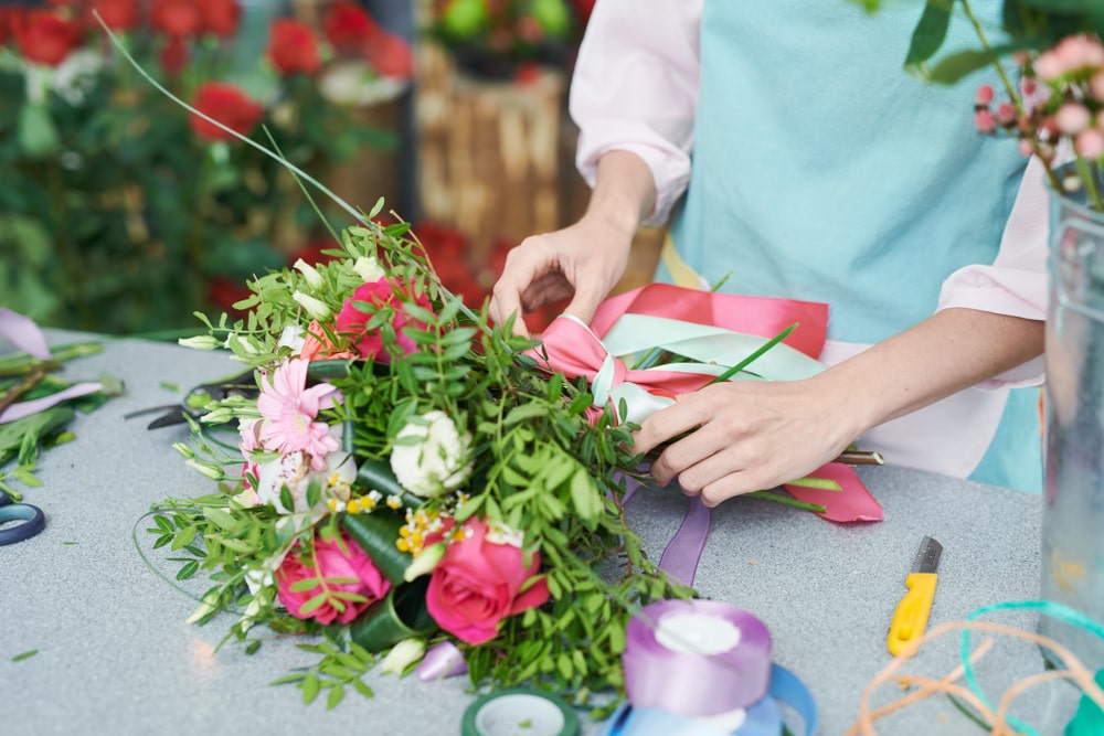 crafting a bouquet of flowers