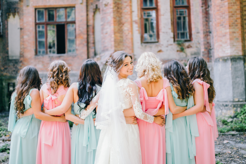 bride with her bridesmaids