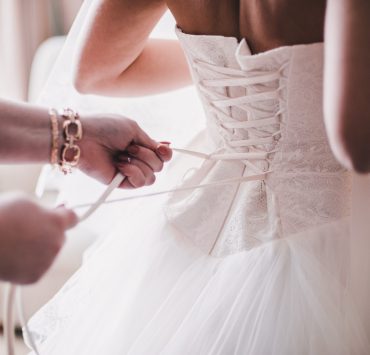 a bride wearing a white dress