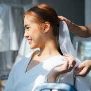 a bride trying out a veil