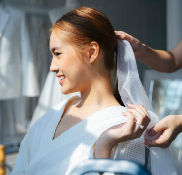 a bride trying out a veil