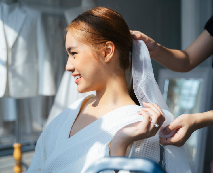 a bride trying out a veil
