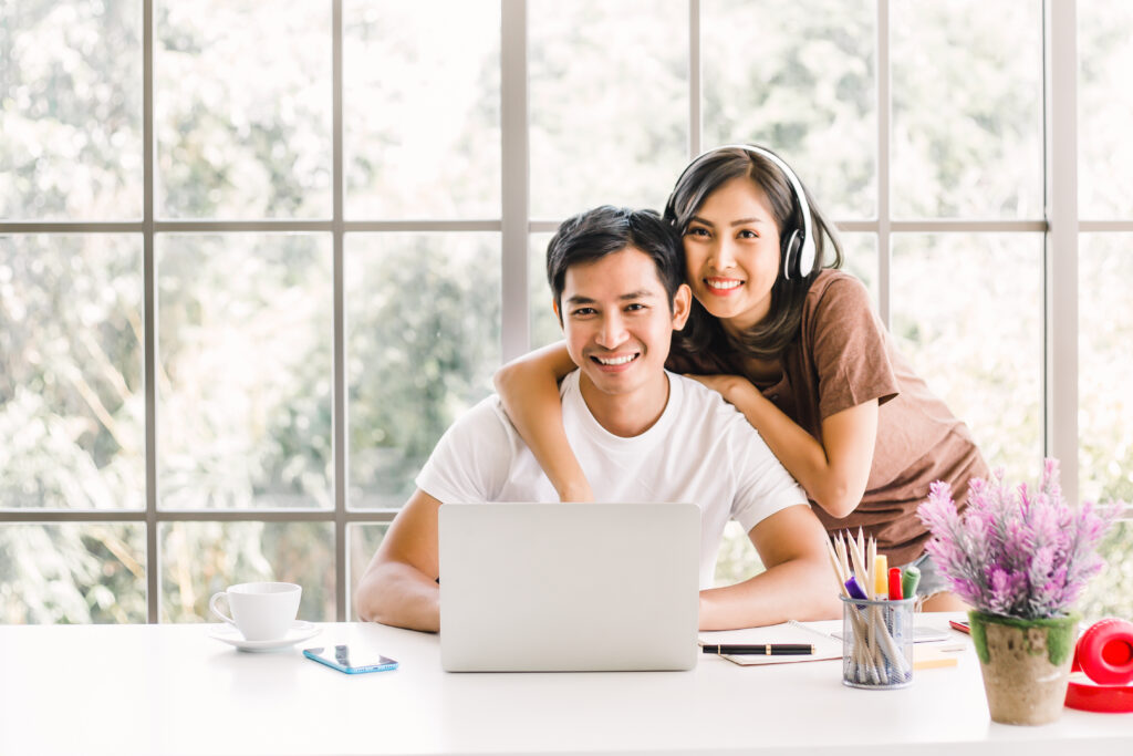 a couple using a laptop