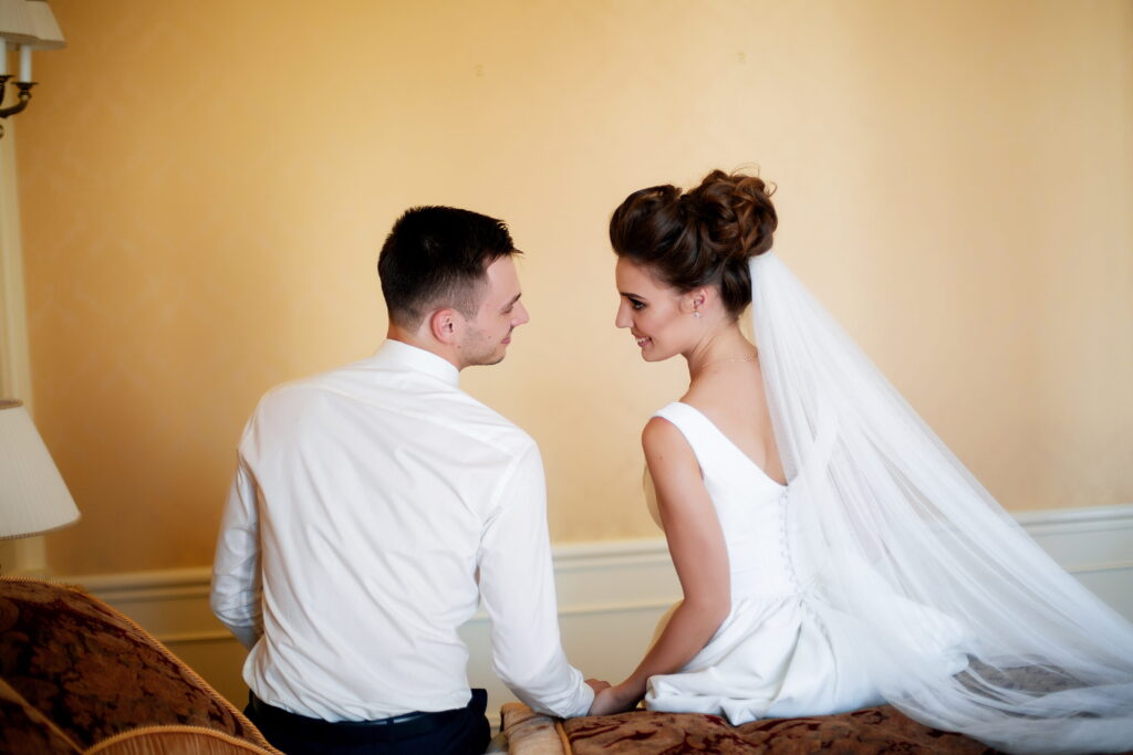 a couple sharing an intimate moment before the wedding.